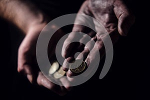 Man hands holding USSR rubles, money on a black background, close-