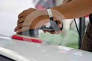 Man hands holding the work tool polish the car.Buffing and polishing car. Car detailing