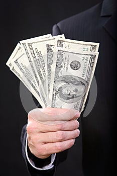 man in hands holds money dollar business