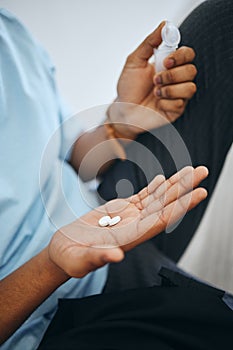 Man hands, medicine pills and medical tablet treatment for sick, healthcare and pharmaceutical drugs help. Closeup