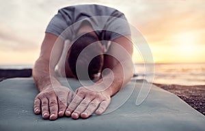 Man hands, meditation and yoga at the beach, peace and zen with spiritual healing and energy balance with exercise