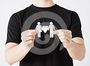 Man hands with paper men