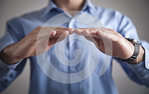Man hands with protect gesture