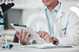 Man, hands and tablet in science laboratory for chemistry development, research and medical software for investigation