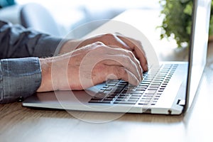 Man hands typing on computer keyboard closeup, businessman or student using laptop at home, online learning, internet marketing, w