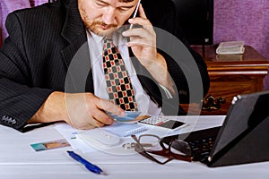 Man hands using laptop and holding credit card with social media as Online shopping concept