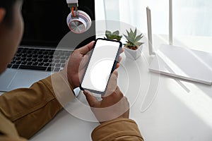 Man hands using smart phone connecting wifi internet at home.