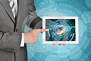 Man hands using tablet pc. Earth and business
