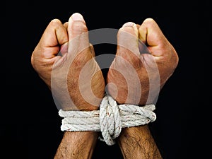 Man hands were tied with a rope. Violence, Terrified, Human Rights Day concept.