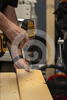 man hands working with tools drill