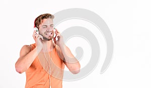 Man handsome bearded guy listening music headphones white background. Melody put over various types of music. It is