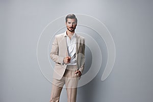 man happy business copyspace smiling handsome suit portrait businessman beige confident