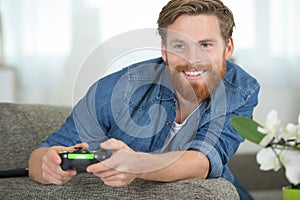 man happy playing video games