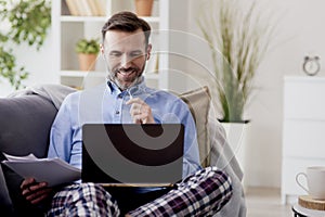 Man happy to work at home.