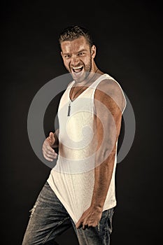 Man with happy unshaven face in studio.