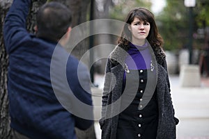 Man Harassing Woman on the Street or a Criminal Stalking Victim