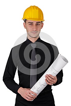 Man with Hard Hat Holding Rolled Up Blueprints