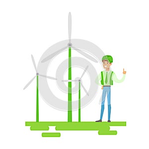 Man In Hard Hat Standing Next To Wind Power Turbines , Contributing Into Environment Preservation By Using Eco-Friendly