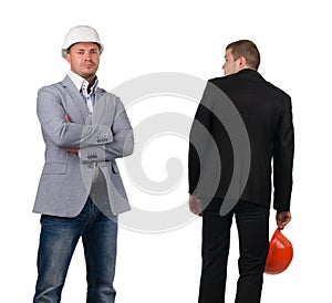 Man with Hard Hat Walking Past Confident Colleague