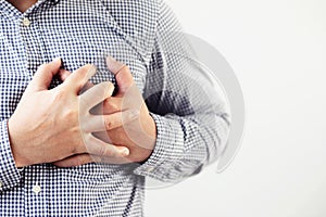 Man has chest pain with heart disease.