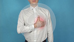 Man has heart pain before Myocardial Infarction or angina pectoris. Myocarditis. Concept of Pericarditis or Endocarditis