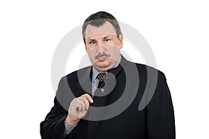 Man has pinned communist badge photo