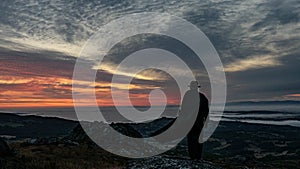 Man with hat and cape