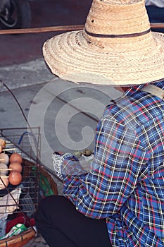 Man hat is carrying for the sale