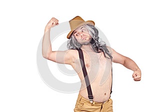 Man in hat shows muscles.