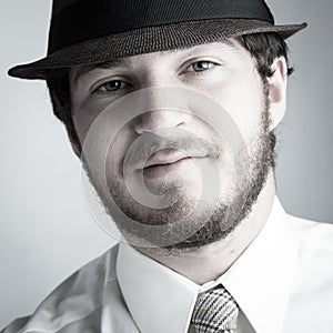 Man in hat and Tie