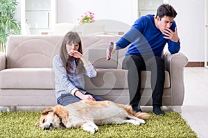 The man having allergy from dog fur photo