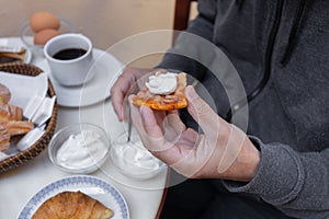 man having breakfast outdoors, Greece, Crete, Chania