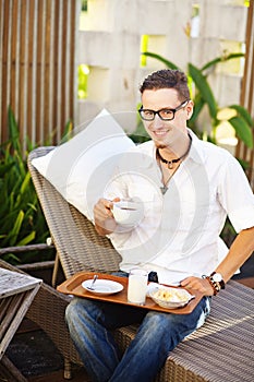 Man having breakfast at resort