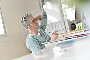 Man having coffee at work