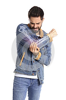 Man having elbow pain on white background. Digital compositing with illustration of arm bones