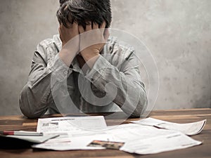 Man having financial problems with invoices and Credit Cards, Money concept., real estate, buy an apartment photo