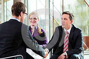 Man having an interview with manager and partner employment job