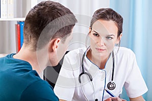 Man having medical consultation