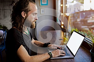 Man having online training course via notebook