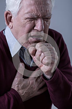 Man having pain in chest photo