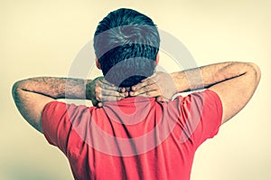 Man having pain in his neck - retro