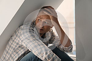 Man having panic attack indoors