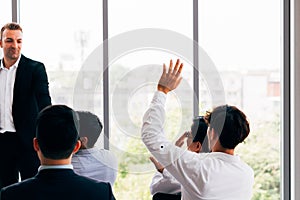 Man having question during seminar