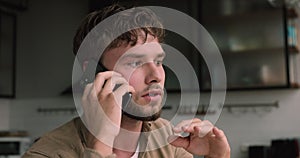 Man having serious conversation on the phone