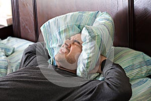 Man Having Trouble Sleeping photo