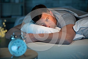 man having trouble sleeping