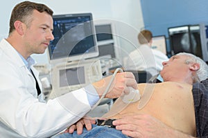 Man having ultrasound in abdomen