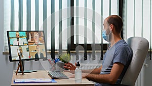 Man having video call with remote team