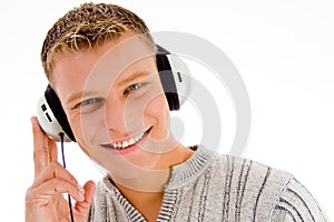 Man with headphone looking at you