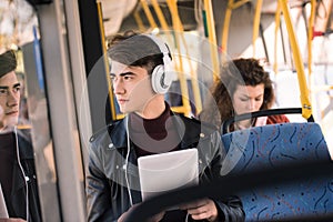 man in headphones with digital tablet